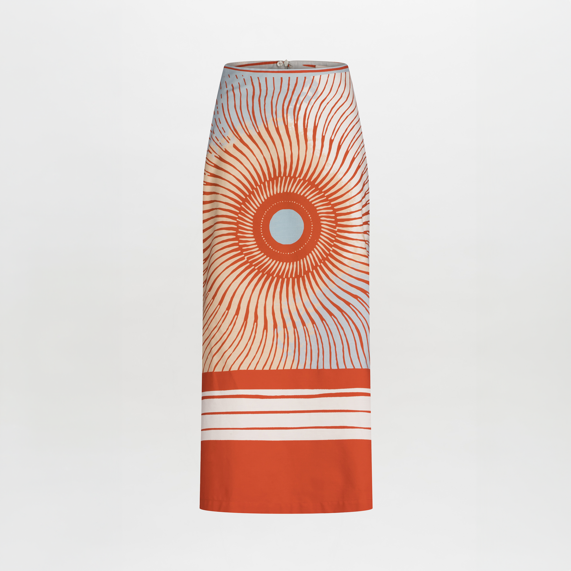 The Atira Skirt by SVT DESIGNS is a high-waisted, 100% cotton midi skirt featuring a multicolor abstract sunburst print with bold horizontal white stripes near the hem on a plain background.