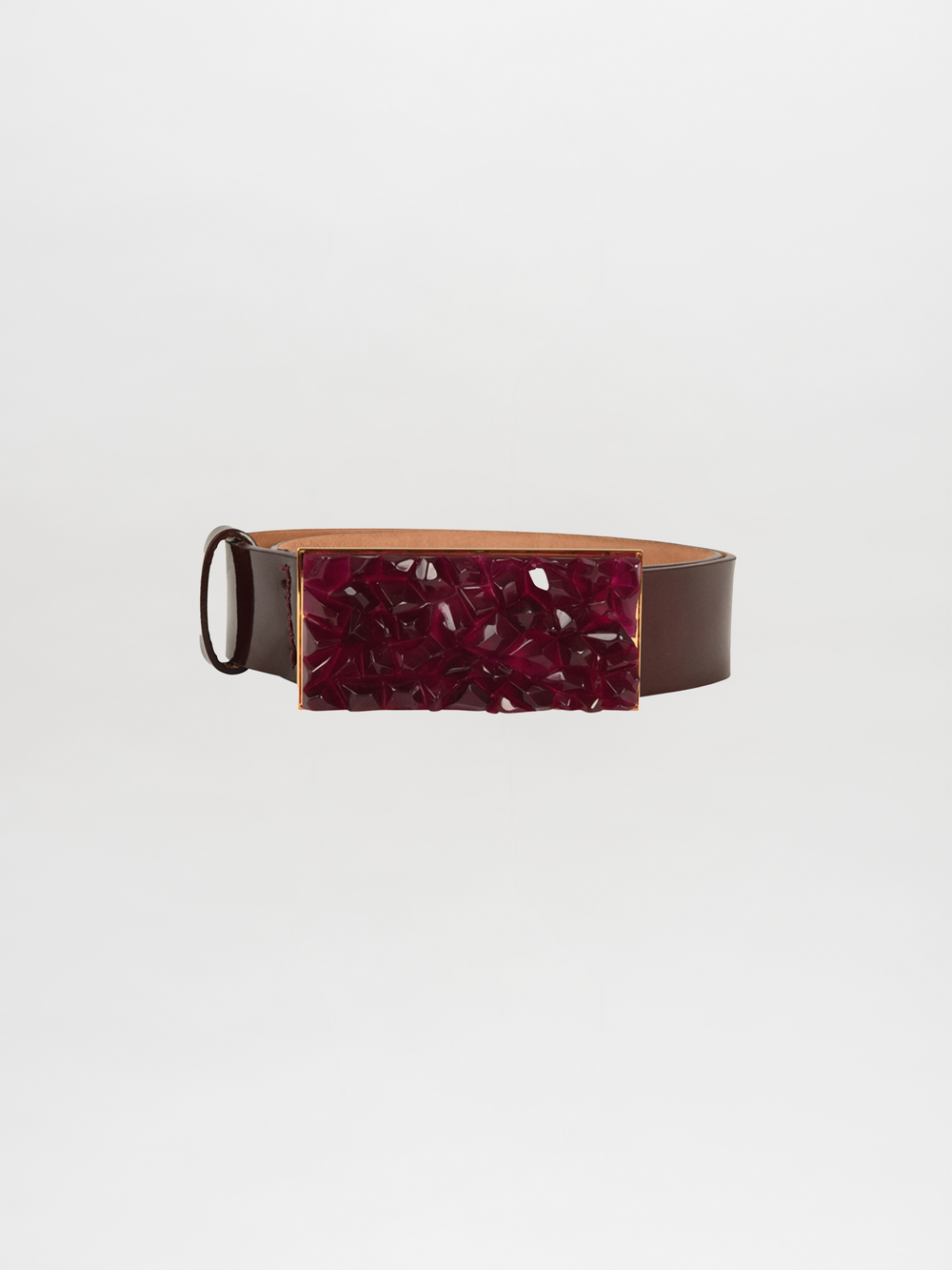 The Dora Belt Brown Burgundy by SilviaTcherassi is a dark brown leather belt featuring a wide rectangular modern resin buckle with a textured dark red surface and glossy finish, set against a plain white background for a sophisticated touch.