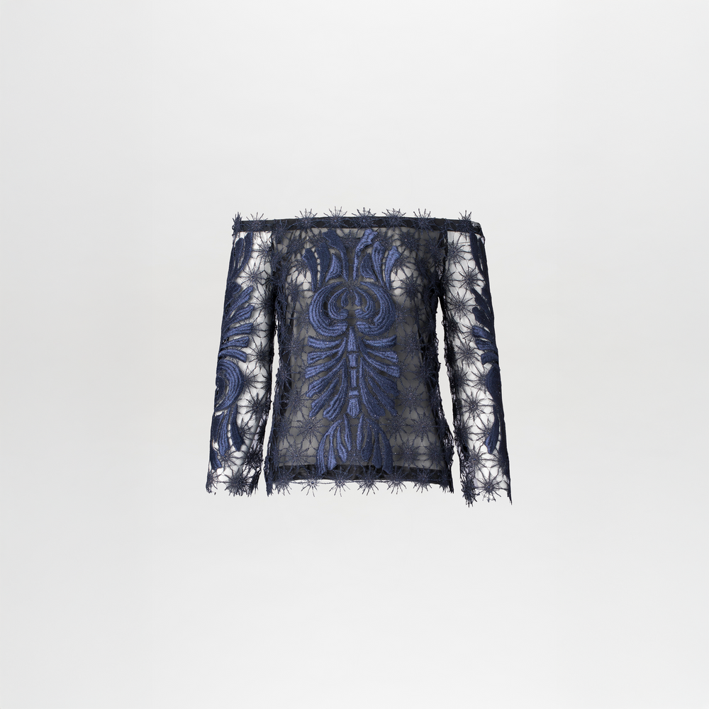 The Lala Blouse by SVT DESIGNS is a navy blue, long sleeve strapless top with guipure lace featuring intricate floral and geometric patterns, displayed on a plain white background.