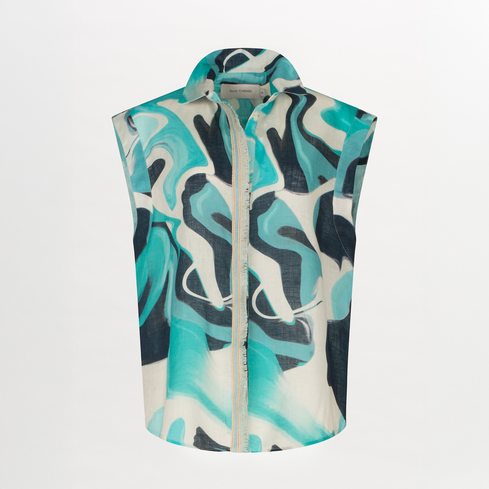 The Rina Blouse by Silvia Tcherassi US is a sleeveless linen top with a wide collar and an abstract blue, teal, black, and white print on lightweight fabric, shown against a plain white background.