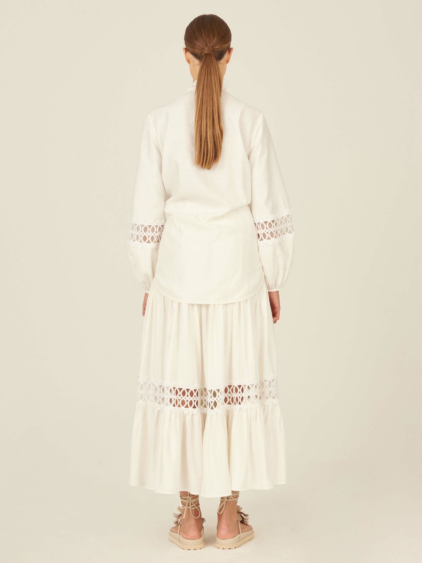 A white Cher Skirt White with lace trim.