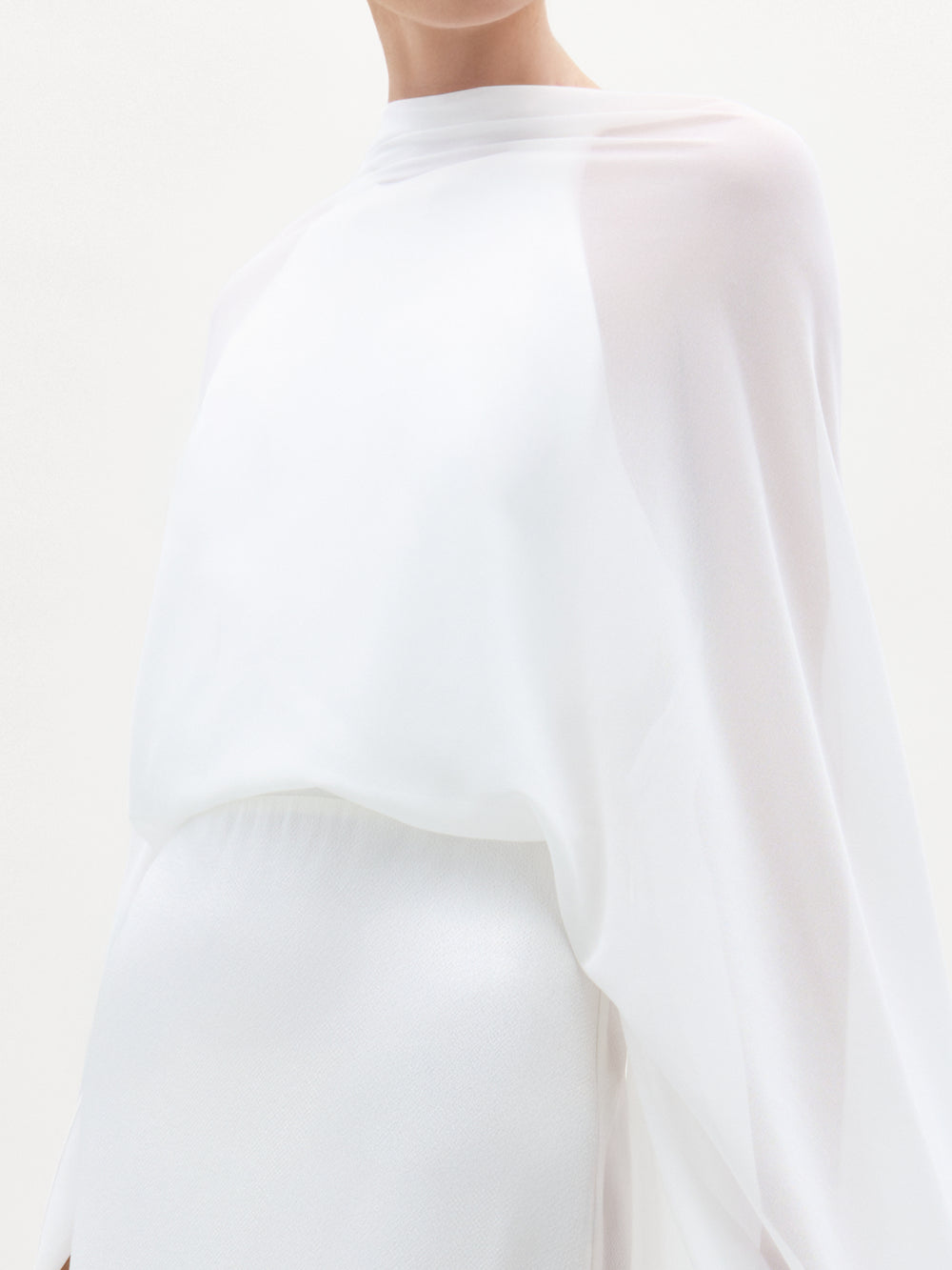 White long-sleeve shirt on a white background