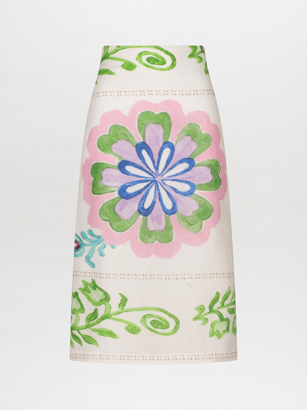 The Atira Skirt by Silvia Tcherassi US is a high-waisted midi skirt made of 100% linen, showcasing a large floral print with pink, green, and blue accents. Swirling green motifs frame the central flower on a simple straight cut against a plain background.
