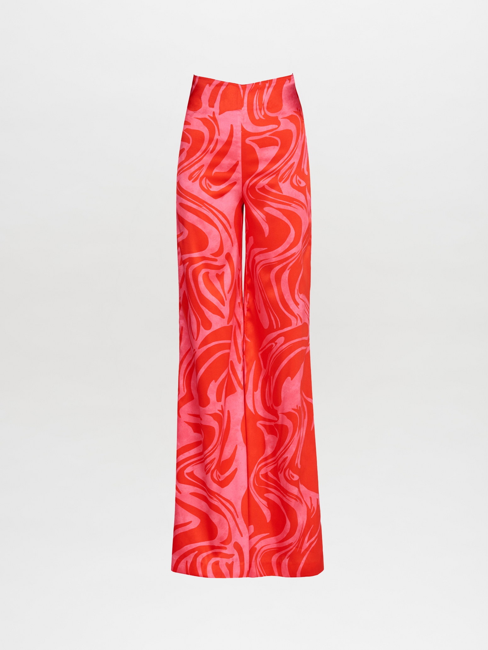 Introducing the Andie Pant by Silvia Tcherassi: high-waisted red and pink trousers with an abstract swirl pattern. Made from soft, silky fabric, these classic wide-leg pants are displayed against a white background, offering a seamless blend of style and comfort.