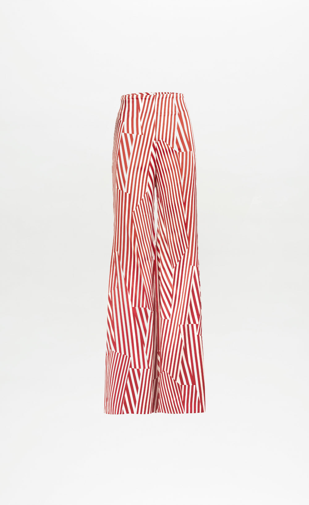 The Andie Pant by SVT DESIGNS is a wide-leg, high-waisted style made from Italian fabric, showcasing bold red and white geometric stripes on a crisp white background.