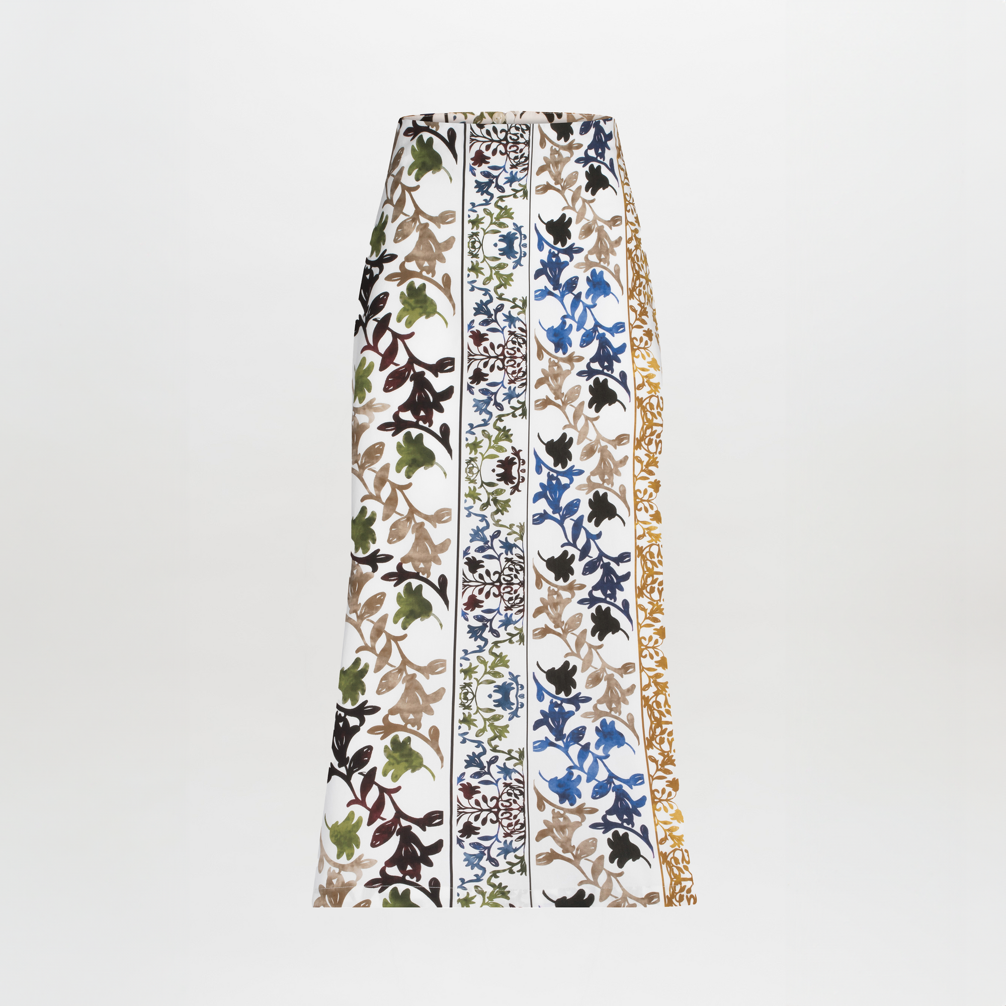 The Atira Skirt by SVT DESIGNS is a chic high-waisted midi skirt with vertical floral patterns in black, green, brown, blue, and gold on a white background, featuring a multicolor abstract print in alternating stripes.