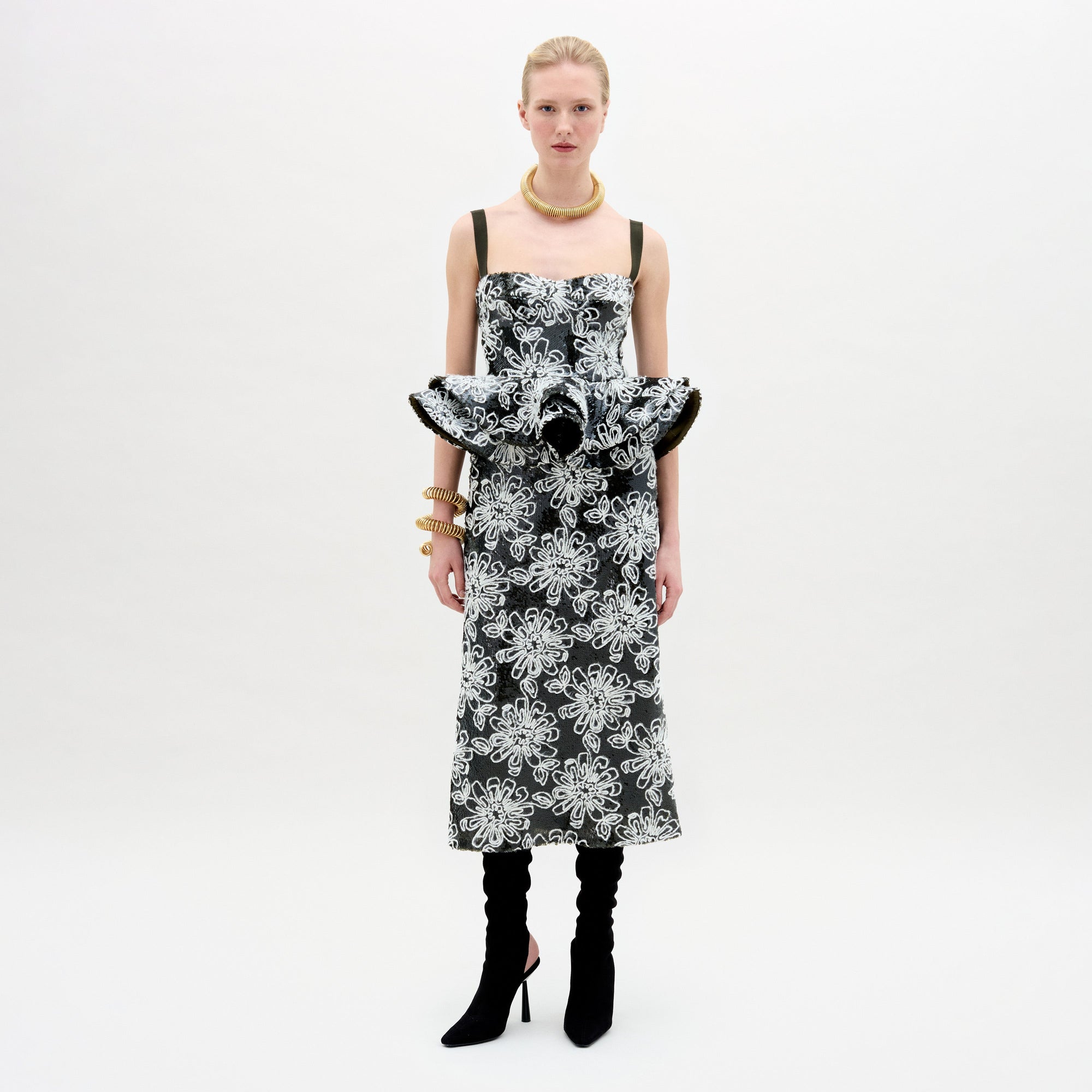 A woman wearing the Blair Skirt black and white on a white background