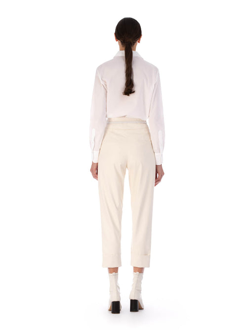 White Moad Pant Pearl with pleating details and a belted waist, displayed against a plain background.