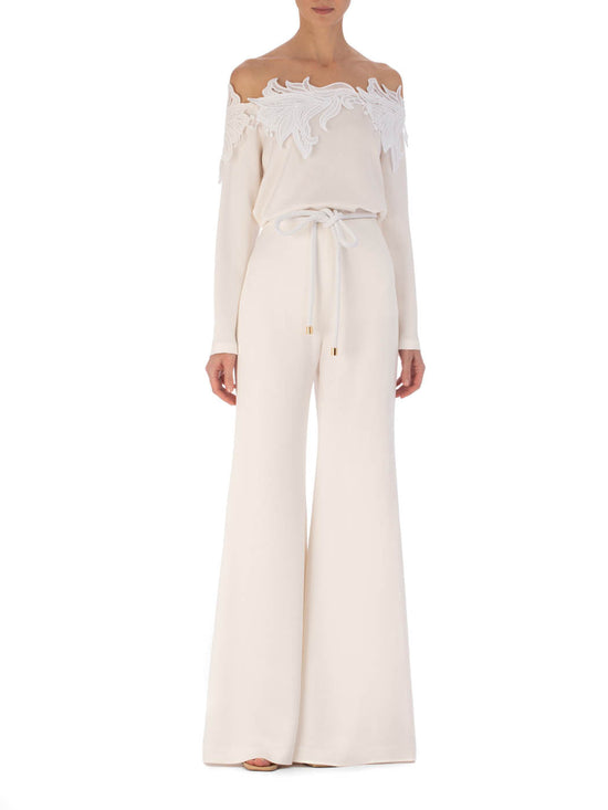 Palermo Pant White-colored high-waisted palazzo pants with a hammered texture fabric on a plain background.