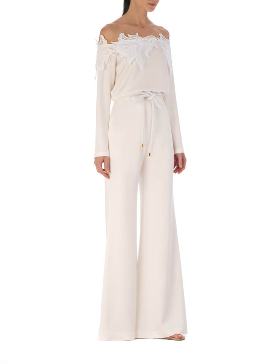 Palermo Pant White-colored high-waisted palazzo pants with a hammered texture fabric on a plain background.
