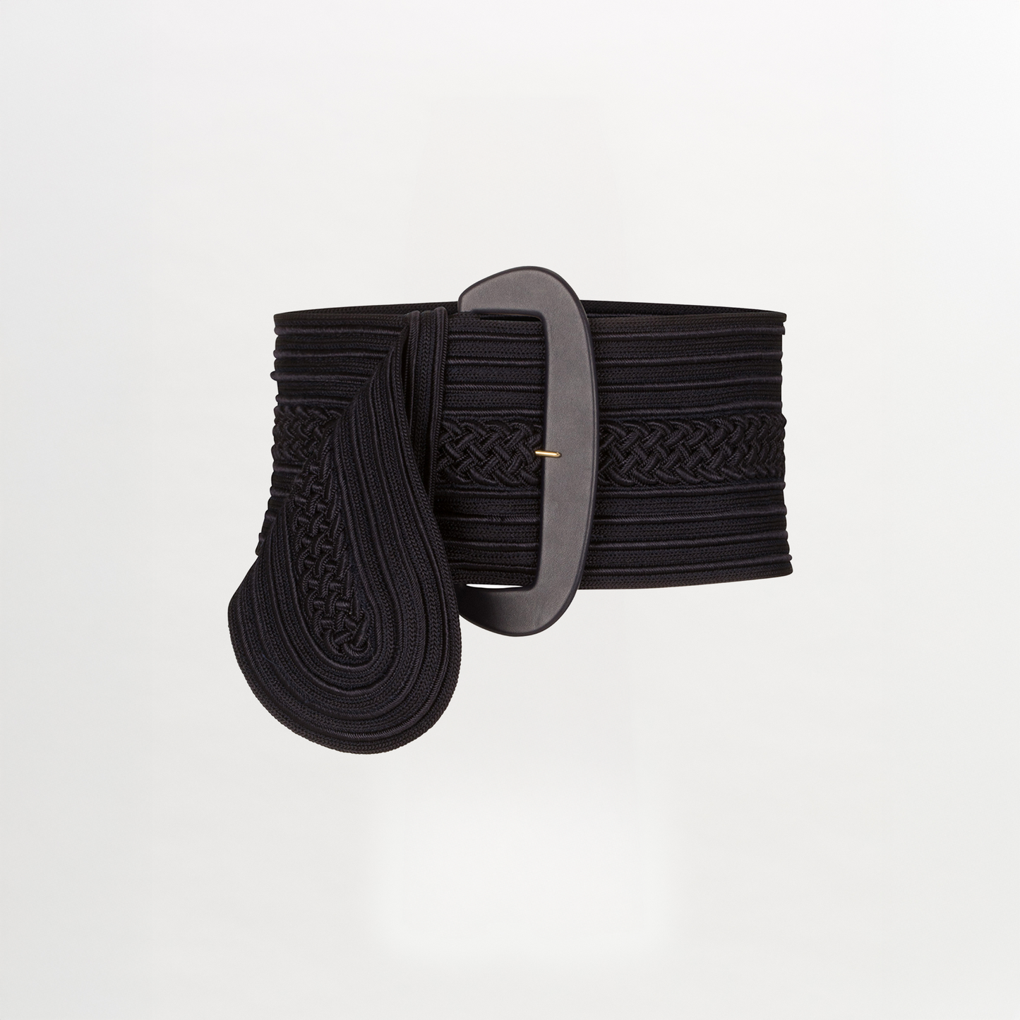 The Chenoa Belt by Silvia Tcherassi US is a wide black woven belt crafted from 100% Viscose, featuring an intricate braided pattern and a large rectangular buckle, showcased on a plain white background.