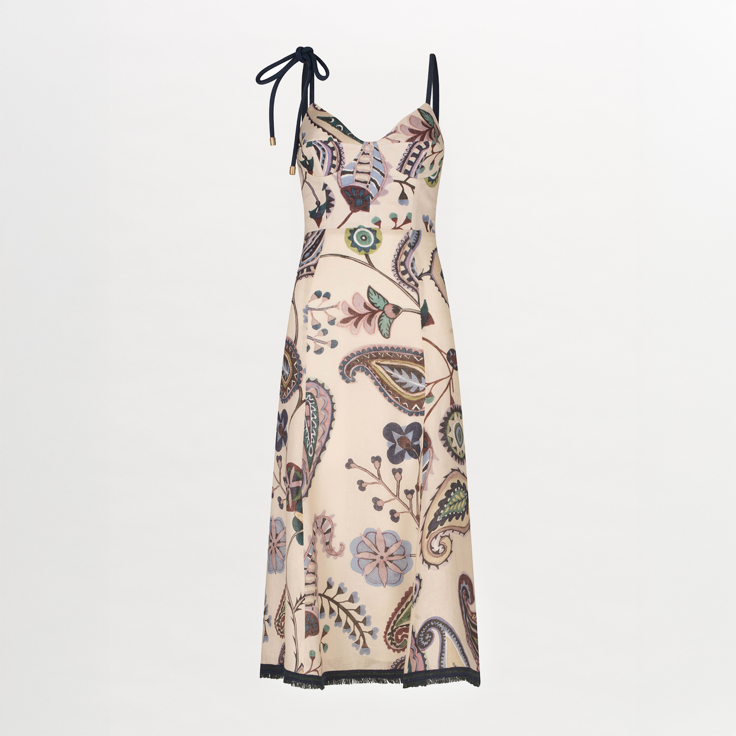 The Dalil Dress by Silvia Tcherassi US is a sleeveless, cream midi dress with a fitted bodice, black trim, single shoulder tie, and abstract paisley print with multicolored floral accents.