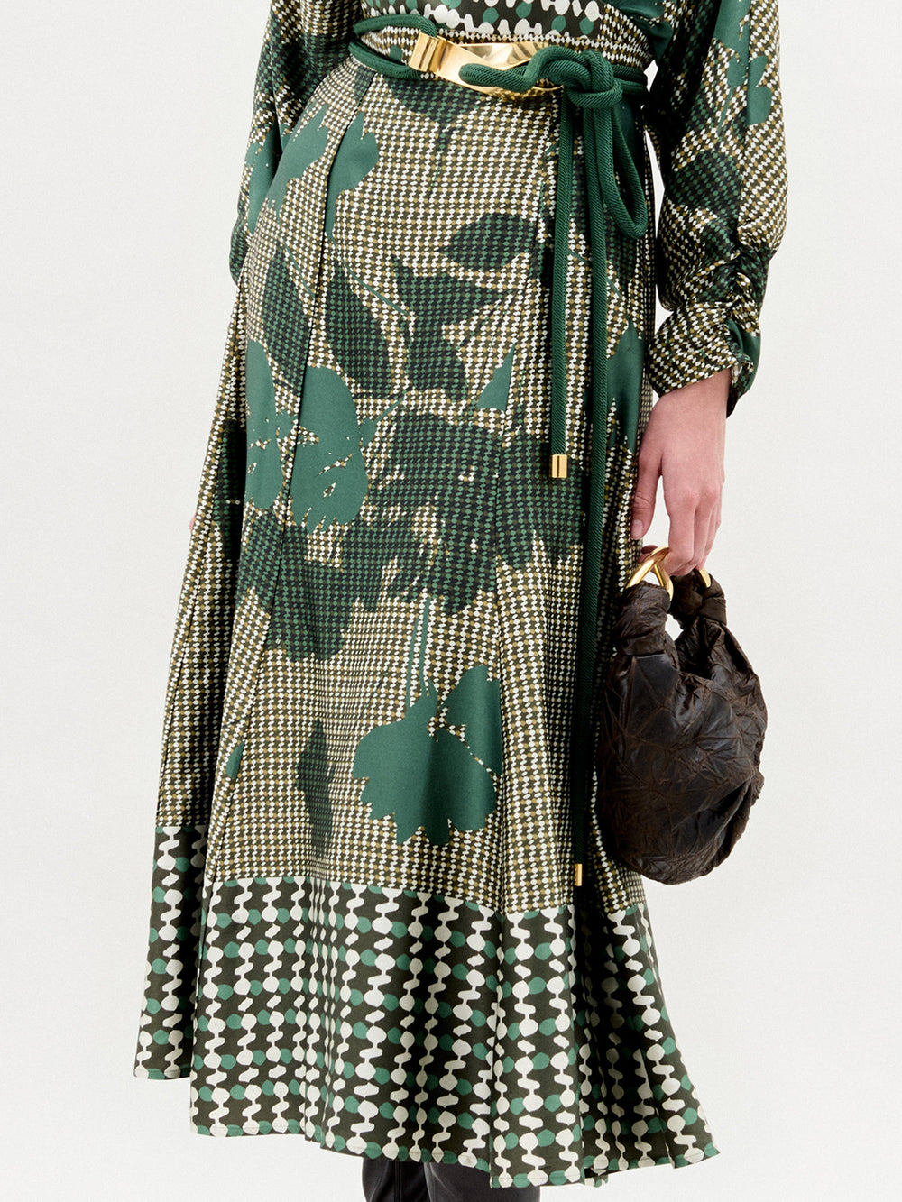 Green patterned coat with a white background