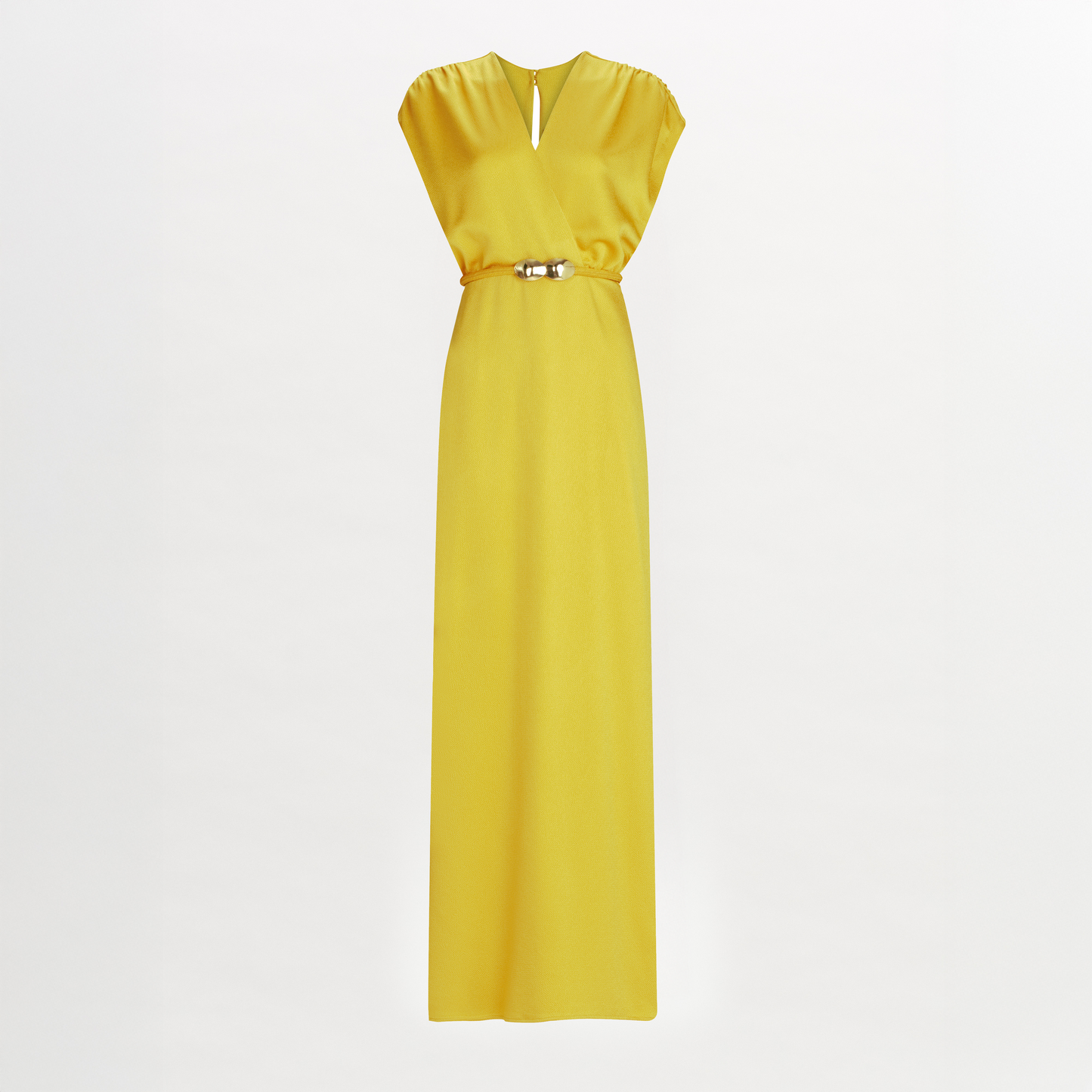The Freda Dress by SVT DESIGNS is a long, sleeveless yellow hammered satin maxi with a V-neckline, chest keyhole, and thin metallic waist belt, shown against a white background.