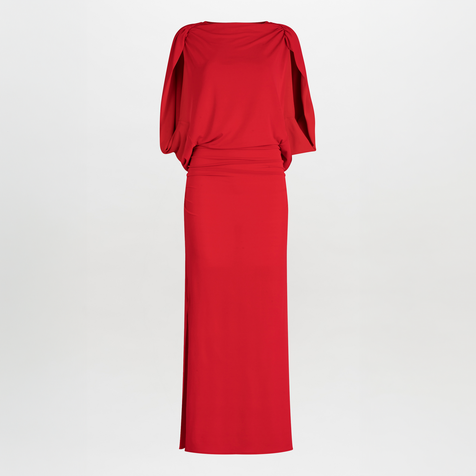 The Harriet Dress from SVT DESIGNS is a long red jersey dress with flowing sleeves and a fitted waist, gracefully extending to the floor, shown against a plain white background.