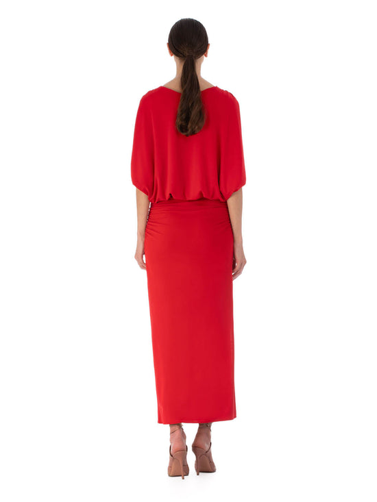 Harriet Dress Rouge evening dress with draped boat neckline, elbow-length sleeves, and a fitted waist on a white background.