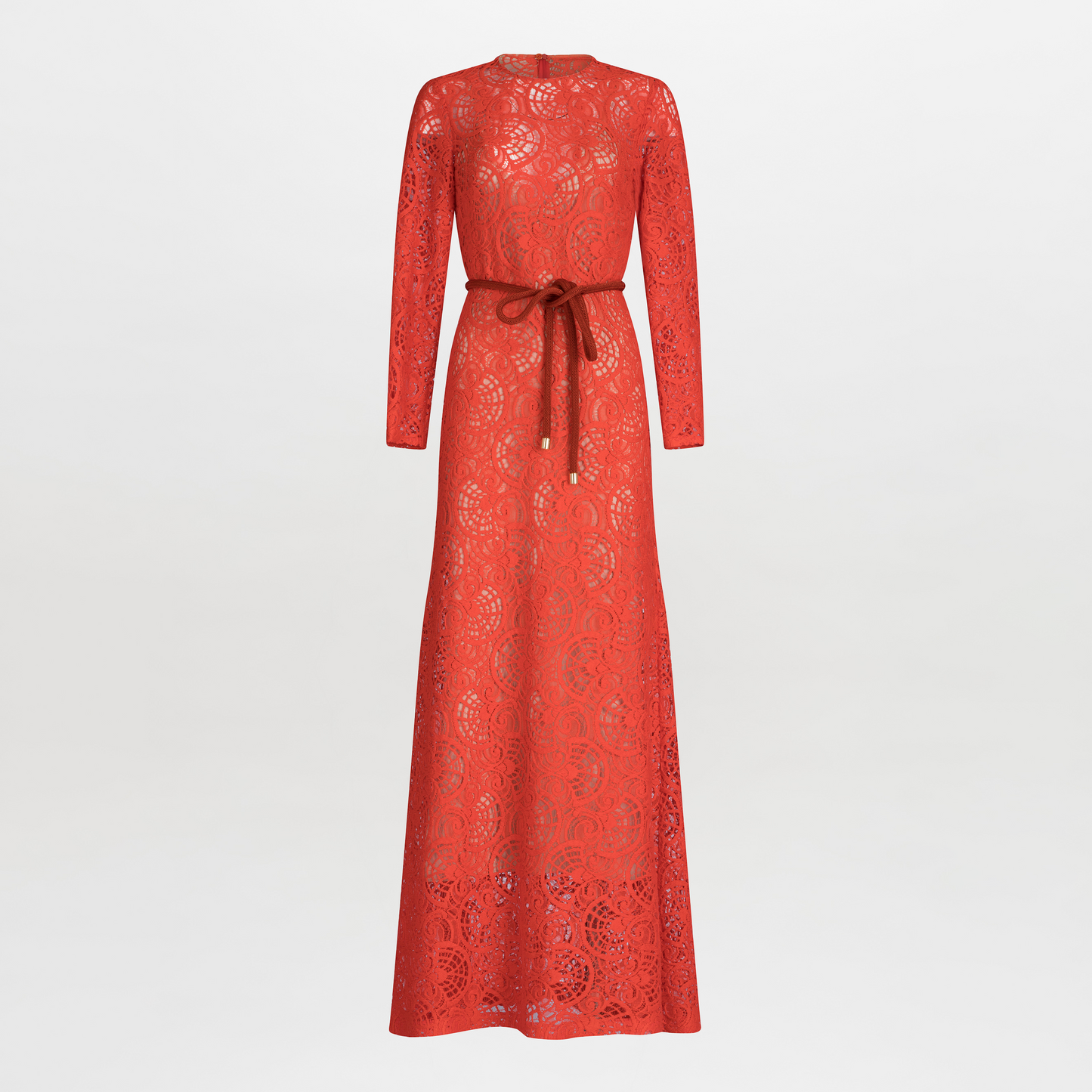 The Ida Dress by SVT DESIGNS is a long-sleeved, full-length red lace dress with intricate floral patterns, a flattering A-line skirt, and a round neckline. It includes a matching red belt at the waist and is photographed against a plain white background.