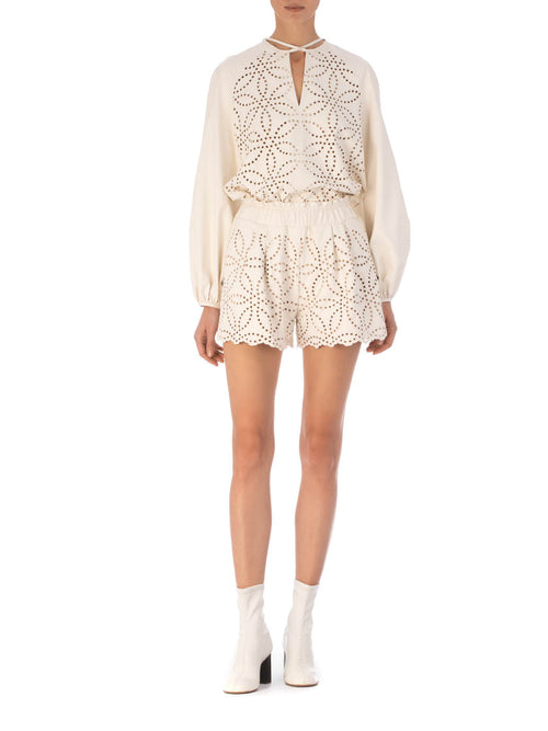 Molveno Blouse Pearl long-sleeve embroidered blouse with laser-cut details and a keyhole neckline, isolated on a white background.