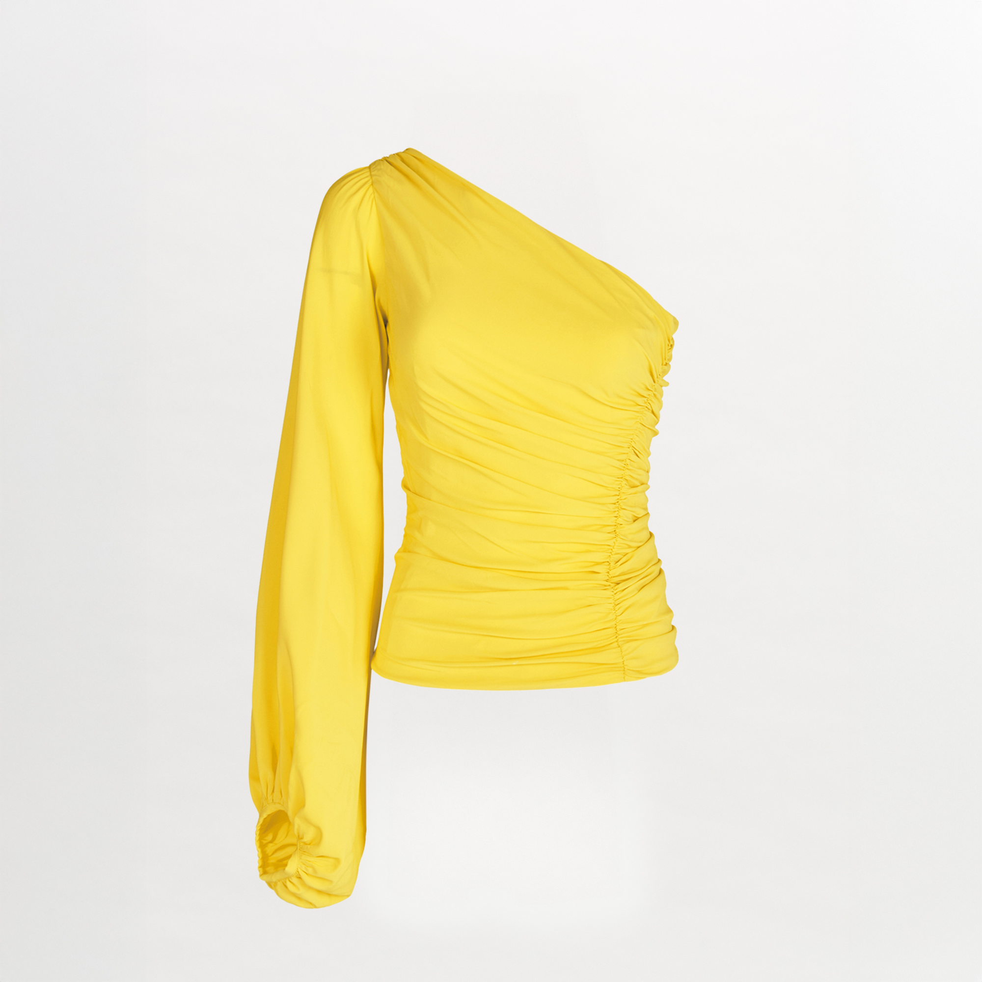 The Oriana Blouse by Silvia Tcherassi is a yellow georgette top with a left single sleeve, front and side ruching, shown against a plain white background.