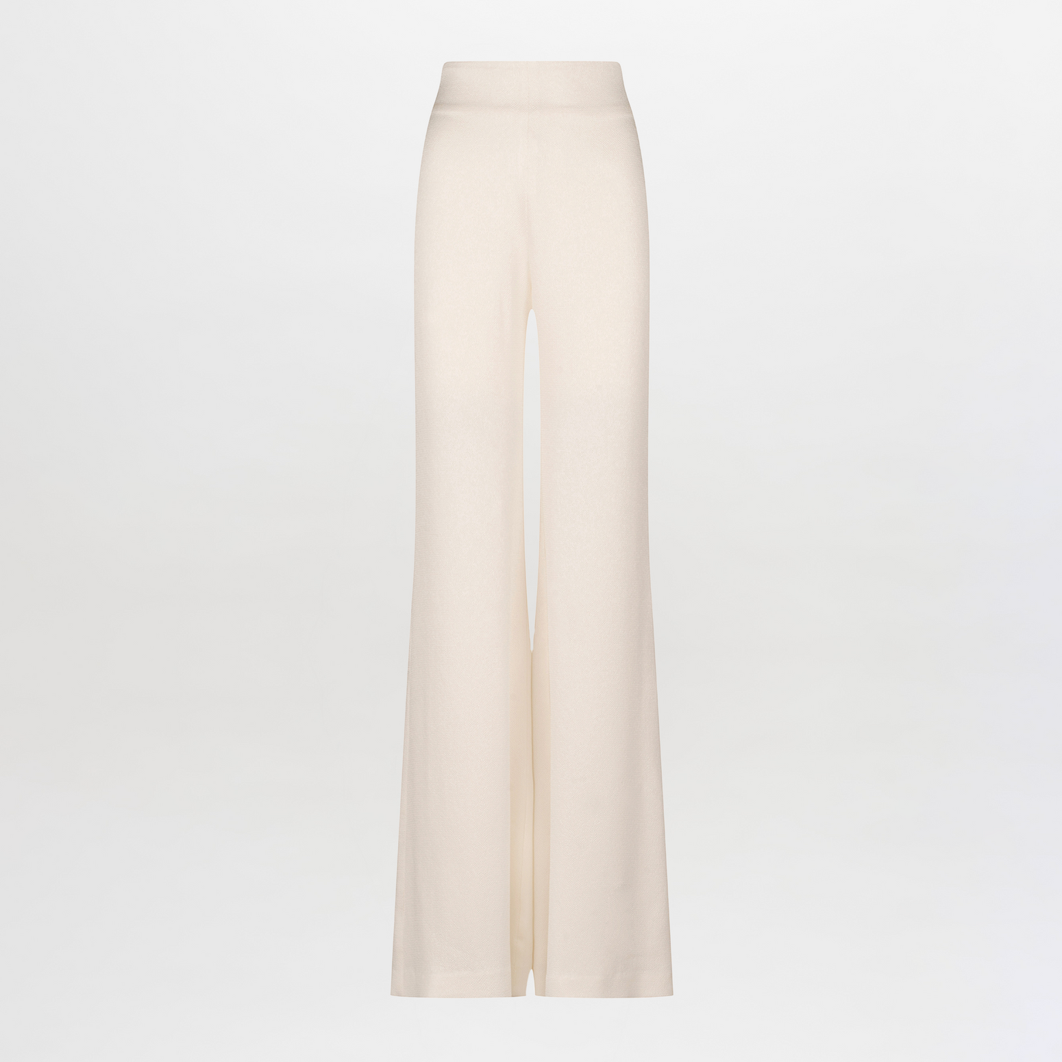 The Palermo Pant by SVT DESIGNS features wide-leg trousers in beige, showcasing a hammered texture and high waist on a plain white backdrop.