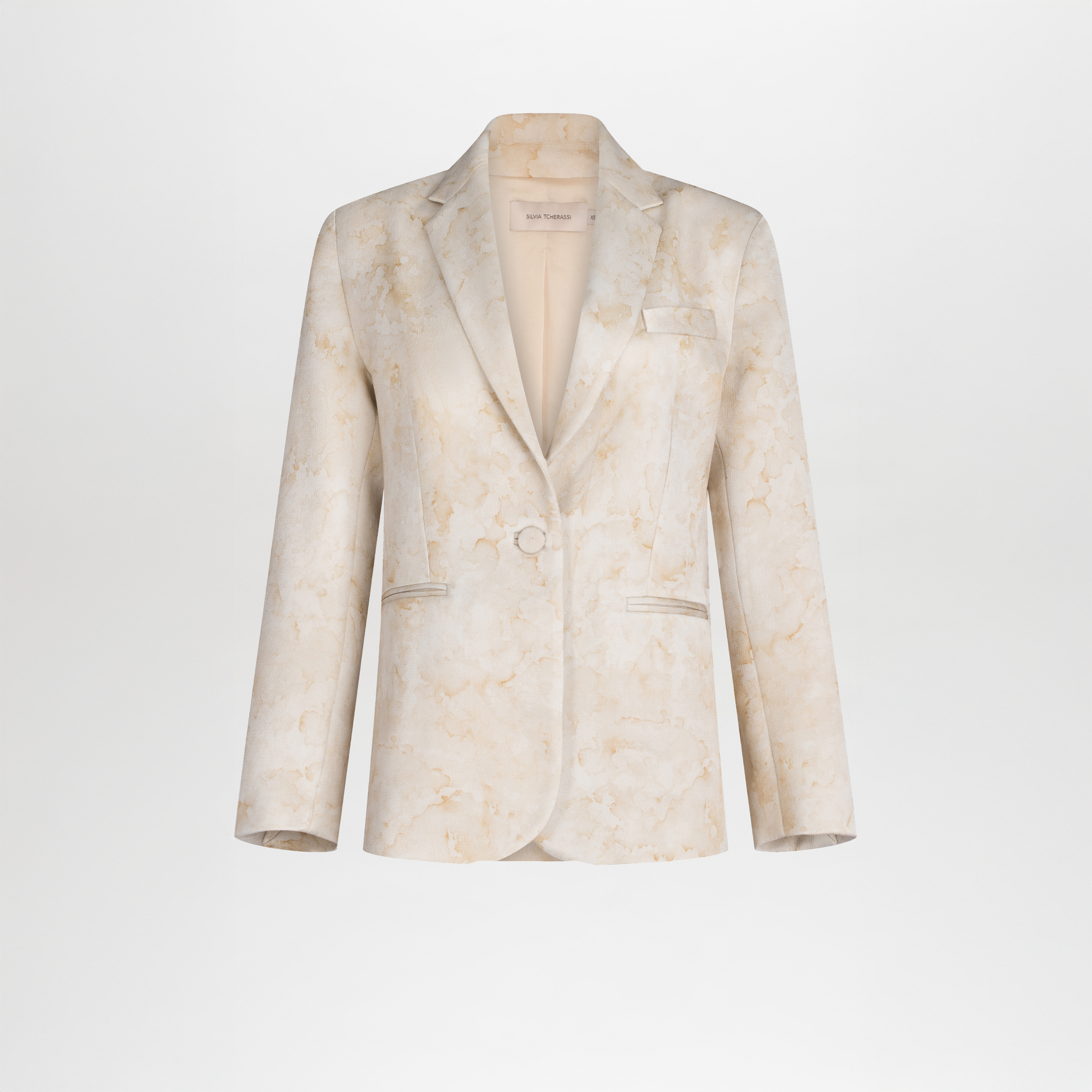 The Rebeca Jacket by SVT DESIGNS is a single-breasted, light beige marble-patterned novelty jacket in crepe satin with notch lapels, a single button closure, two front pockets, and a chest pocket, shown on a white background.