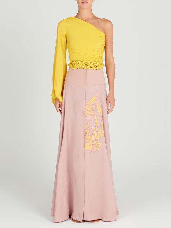 A Modena Skirt Pink with a floral applique design.