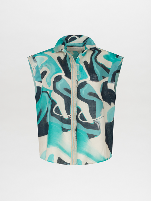 The Rina Blouse by Silvia Tcherassi US is a sleeveless linen shirt with a collar, button-up front, and an abstract multicolor print in blue, teal, black, and white hues.