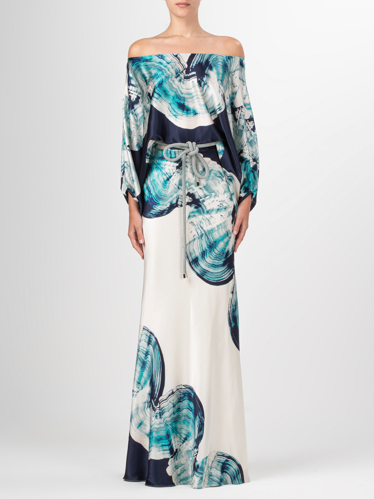 An elegant off-the-shoulder Rossi Dress Navy Abstract Wave featuring a blue and white abstract print on silk fabric.