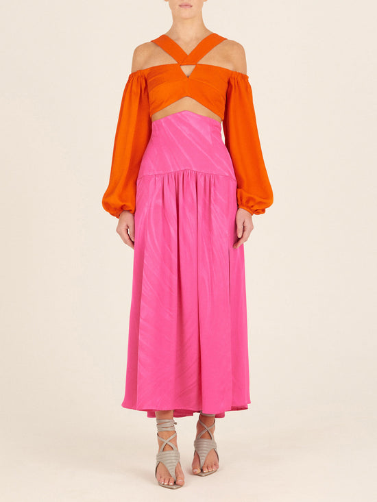 Bright pink sleeveless dress with a high neckline and a full-length, Callie Skirt Fuchsia, displayed on a white background.