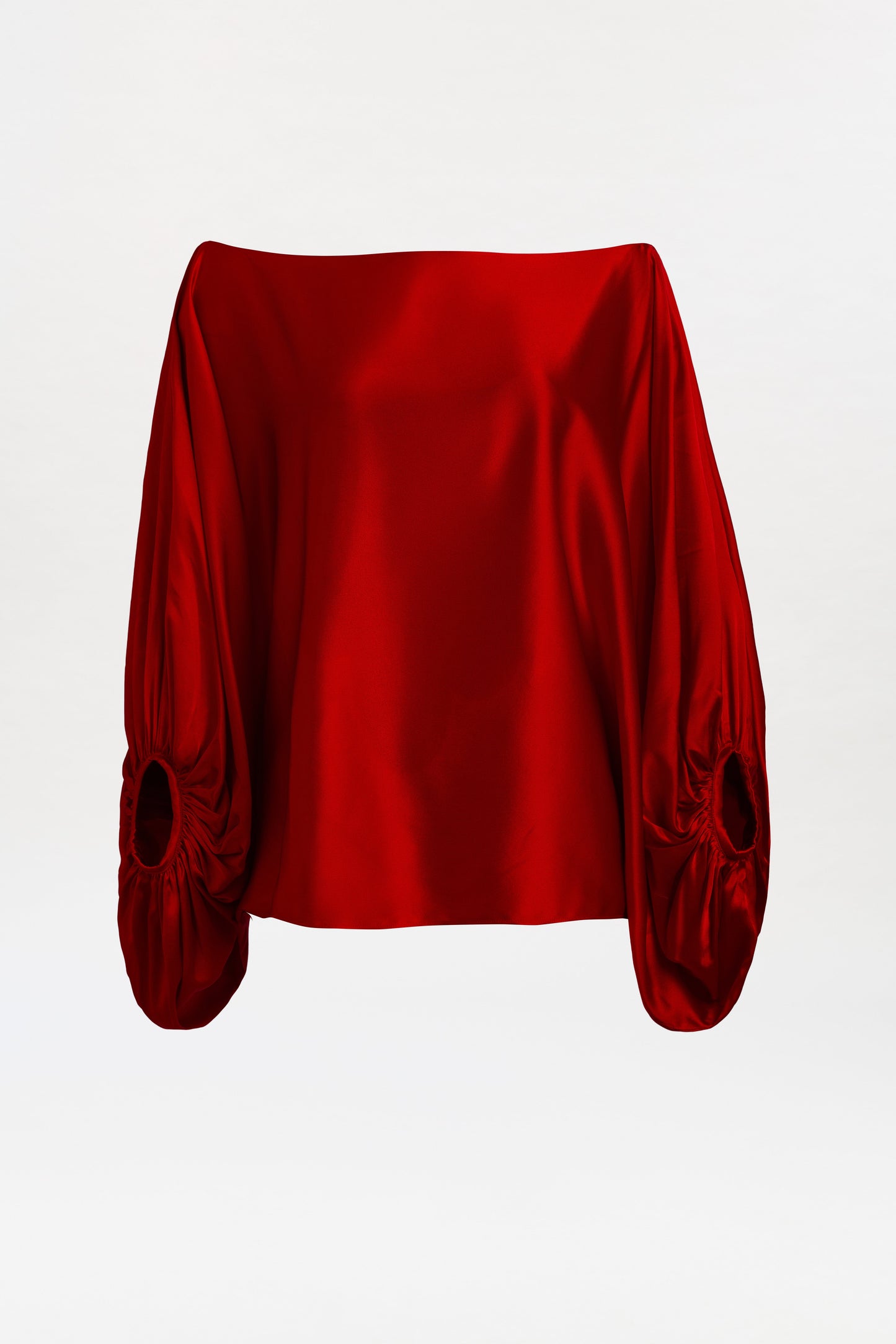 Red satin blouse with puffed sleeves on a white background