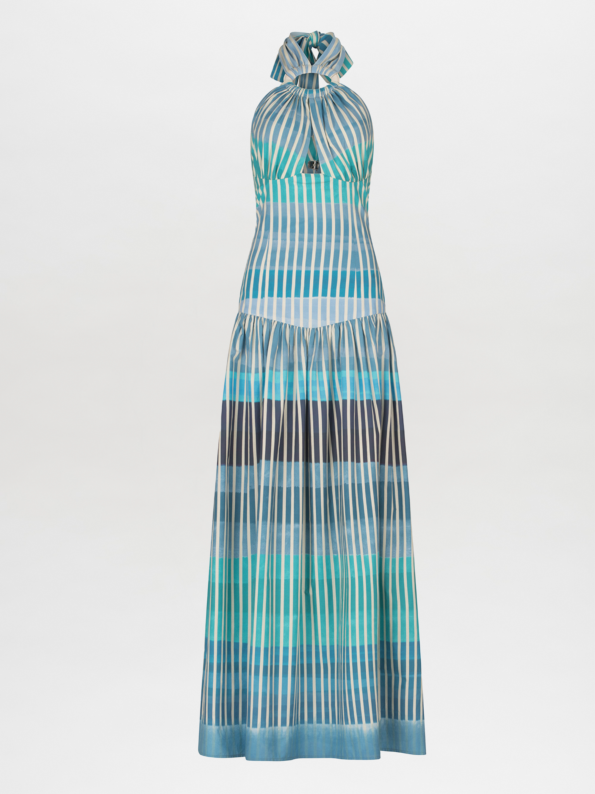 The Traviata Dress by Silvia Tcherassi US features a multicolor stripe pattern in blue, turquoise, and black. It has a halter neckline, gathered skirt, and a front keyhole cutout.