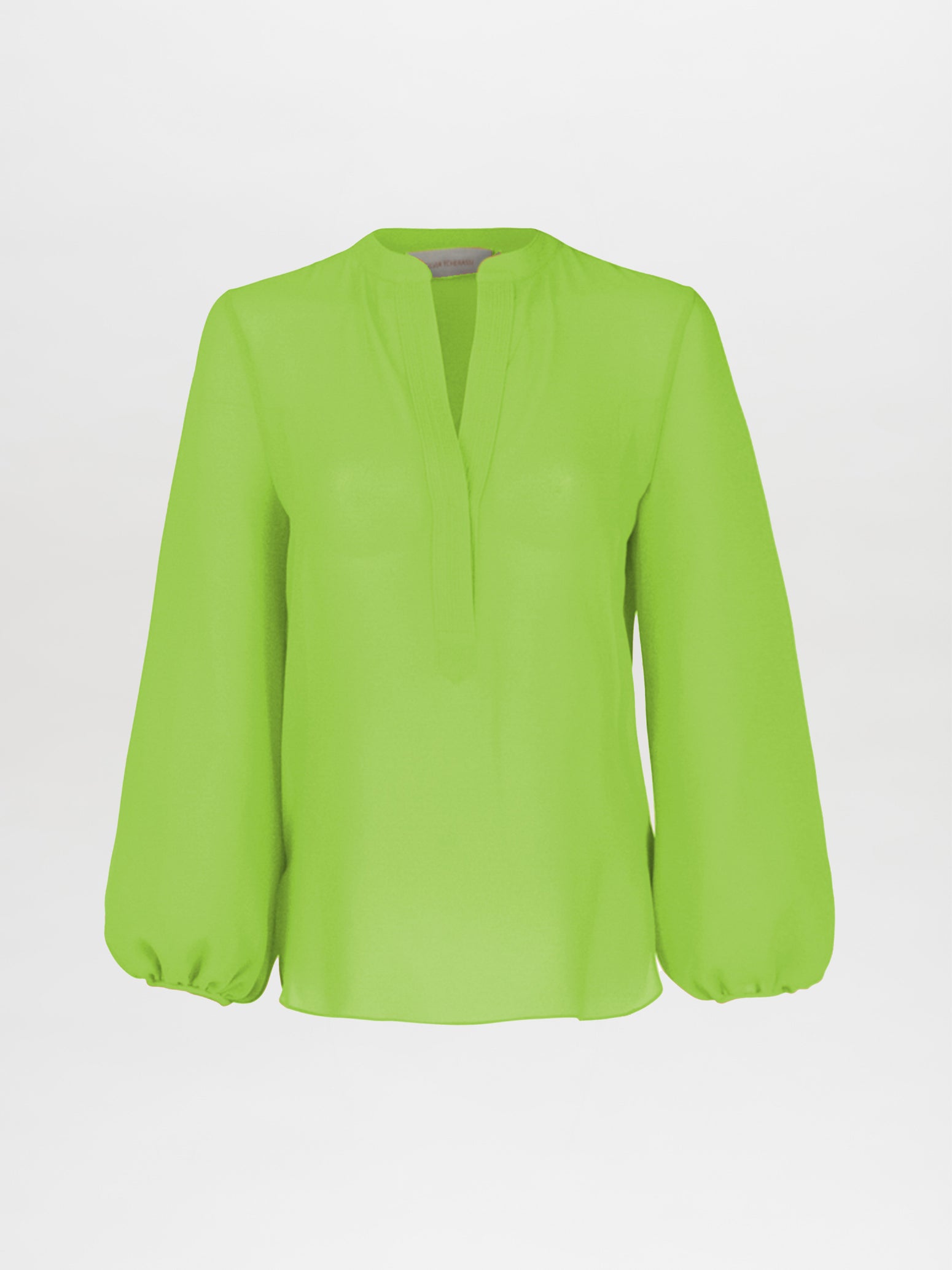 The Triora Blouse Verde Lime by Silvia Tcherassi boasts a chic silhouette with long sleeves and a V-shaped neckline on a plain white background. Slightly puffed cuffs add an elegant touch.