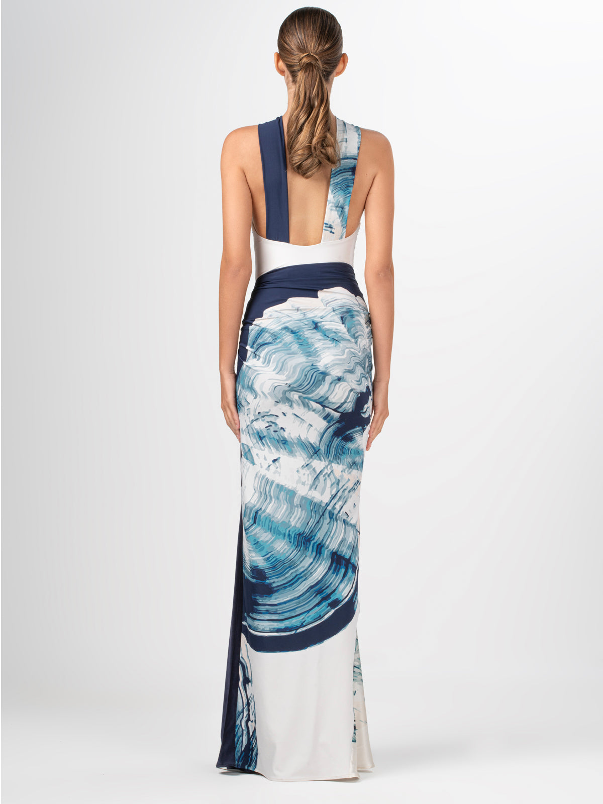 A Alisha One Piece Navy Abstract Wave with an abstract blue and white print made of lycra fabric.