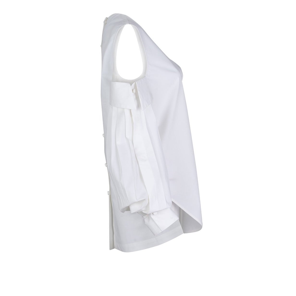 Side view of the SilviaTcherassiEU Corato Shirt, a sleeveless white cotton top with asymmetrical design. It features pleats, side decorative buttons, and a subtle V neckline. The fabric is lightweight and structured.